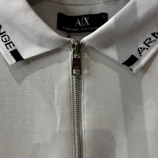 AX logo tipped collar and cuff zip neck pique polo in off white - Image 4